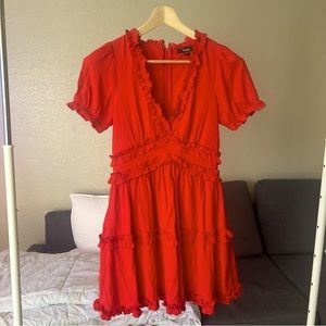 Medium length Red Vneck twirl dress